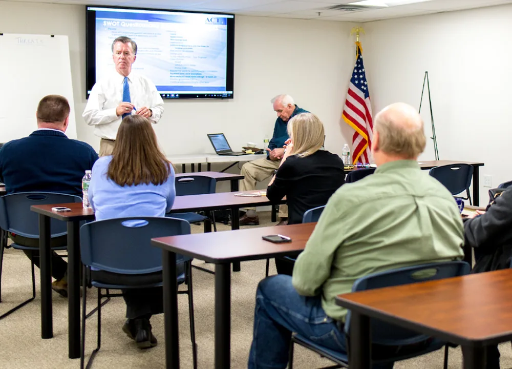 speaker talking to room of people