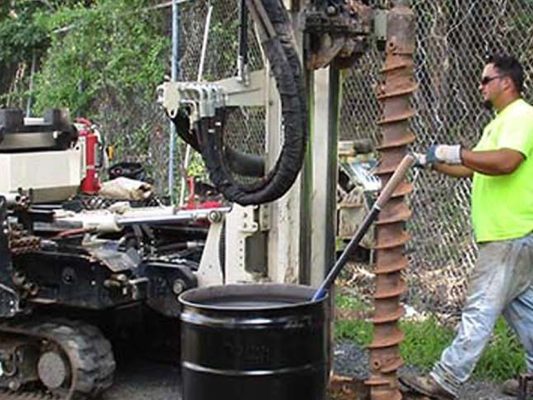 employee pushing gallon