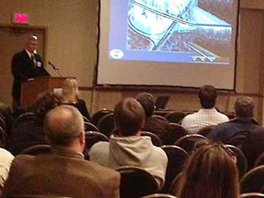 speaker in front audience