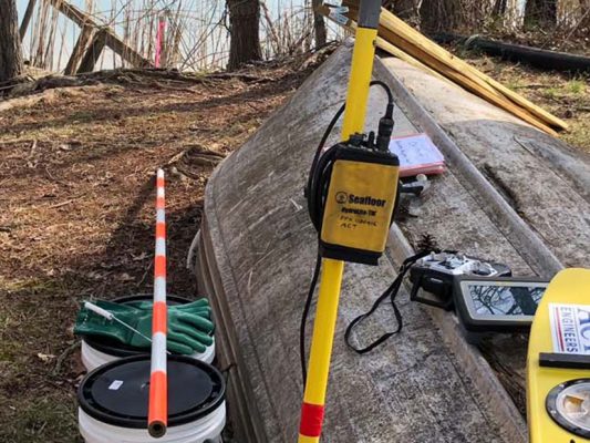 engineering survey equipment on boat